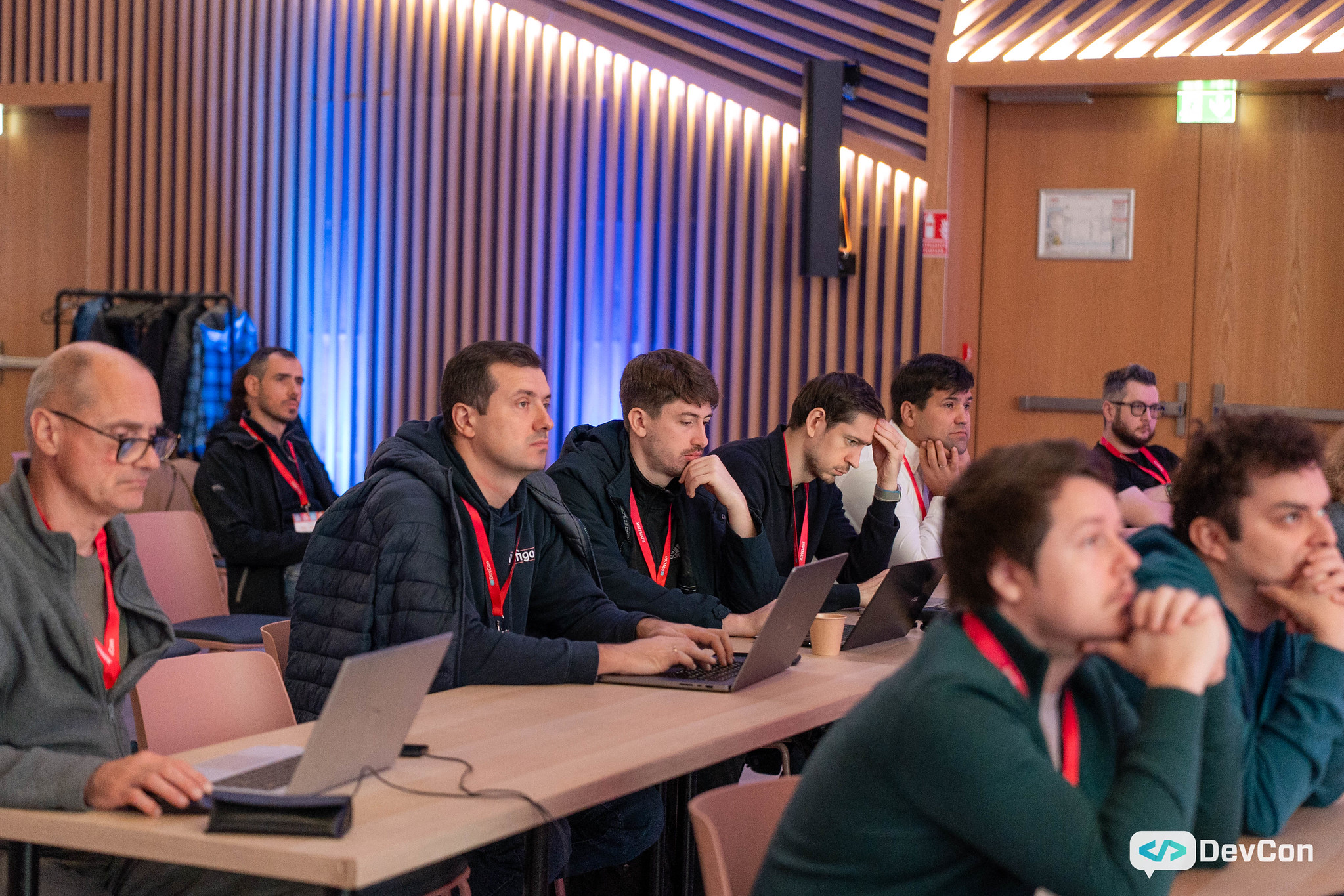 Audience attentively watching a presentation.